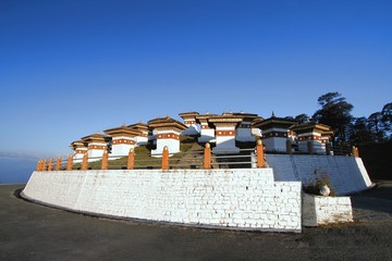 Fototapeta premium The 108 chortens (stupas) is the memorial in honour of the Bhutanese soldiers at Dochula Pass on the road from Thimphu to Punaka, Bhutan