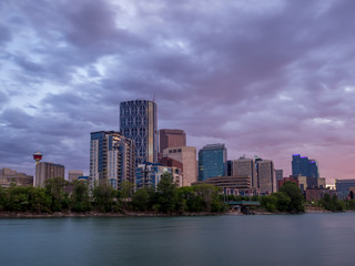 Fototapeta na wymiar Calgary skyline along the Bow river at sunset.