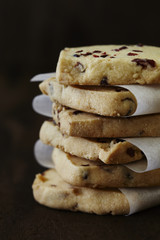 Shortbread cookies on dark wood background.