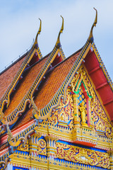 The beautiful golden church and  the blue sky .