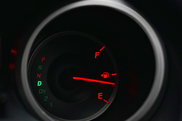 Car Dashboard. Close up image of illuminated car dashboard.