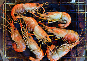 Shrimp grilled bbq seafood on stove, top view