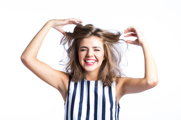 Fototapeta premium Emotional portrait of a young beautiful woman, isolated.