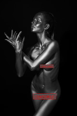 naked body in a silver body painting