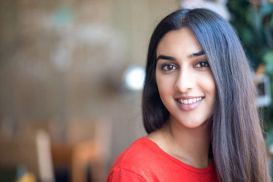 Portrait Of Smiling Beautiful Indian Woman