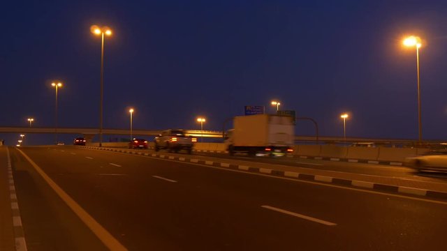 night illumination traffic road bridge panorama 4k uae

