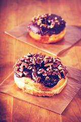 Donuts on a rustic wooden background