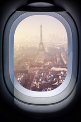 Naklejka premium .Beautiful Eiffel Tower Paris Cityscape from airplane window