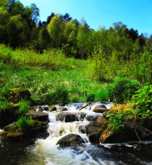 Panoramic image of a mountain river. Beautiful landscape