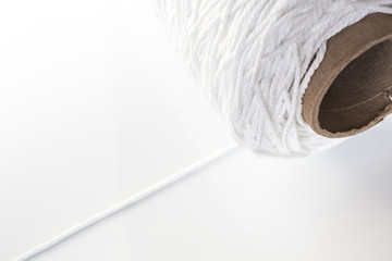 Roll of white rope isolated on white background