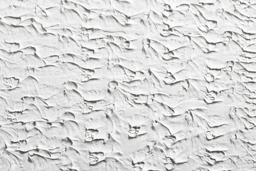 Relief white background, decorative stucco surface, plastered wall texture. Backdrop with free space for text.