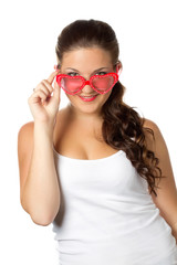 Young girl is holding red sunglasses