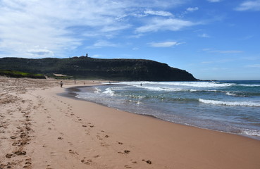 Sydney, Australia - Apr 25, 2017. People relaxing at the beach on ANZAC Day. Palm Beach one of Sydney's iconic northern beaches.