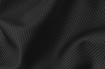 Black fabric, with wavy effect, perfect for the use of background.