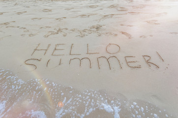 Fototapeta premium Hello summer written on the beach