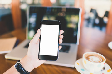girl using smartphone in cafe.