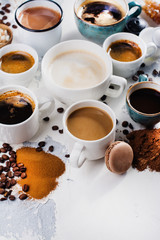 Obraz na płótnie Canvas Variety of coffee in porcelain cups