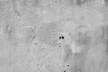 Wall fragment with scratches and cracks