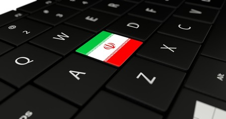 3D rendering close up of Iran flag button on laptop keyboard.