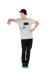 Young handsome guy with a modern clothes and a hat