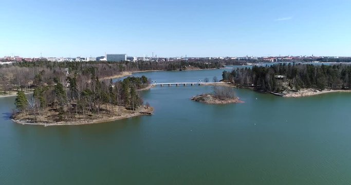 Seurasaari bridge, Cinema 4k aerial flight view over seurasaaren silta, on a sunny spring day, in Helsinki, Finland