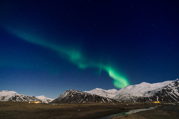 Northen lights over the mountain in Iceland