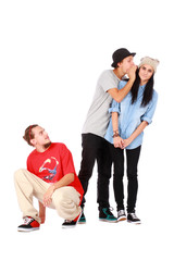 Group of friends whispering on white