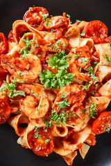 Pappardelle pasta with shrimp, tomatoes and herbs