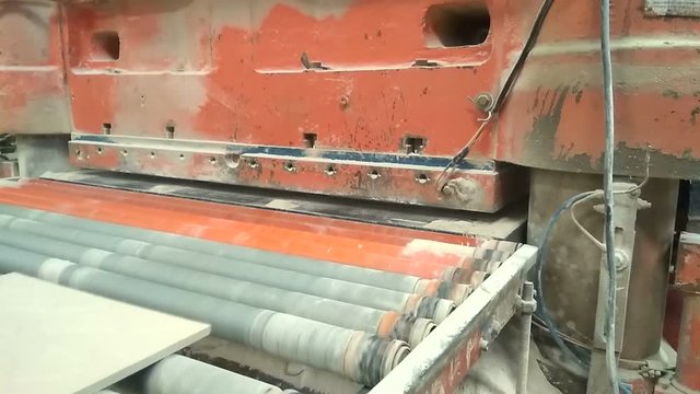Ceramic tile making machine