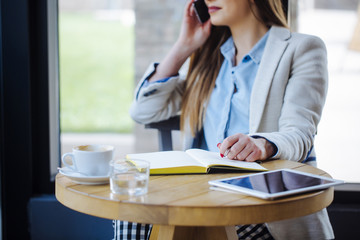 Unrecognizable Woman Talking on the Phone