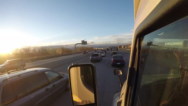 Time Lapse Forward facing footage from the exterior of a Semi Truck traveling down a busy US Highway.