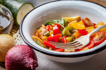 Ratatouille on a rustic table.