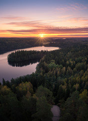 Scenic landscape with sunrise an peaceful lake at autumn morning in National Park