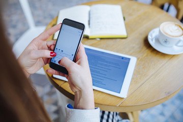 Woman Typing on Phone