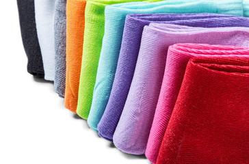 Bright multicolored socks isolated on white background