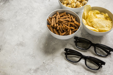 cinema and TV whatching with crumbs, chips and pop corn stone background mock-up