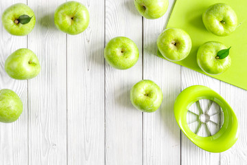 natural food design with green apples white desk background top view mock up