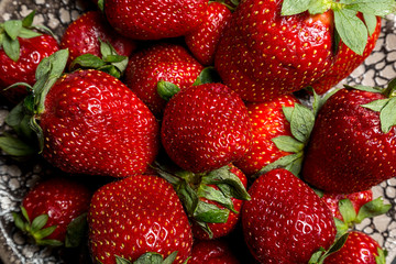 background from fresh ripe useful fruit strawberry closeup