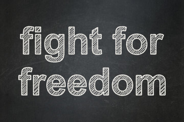 Politics concept: Fight For Freedom on chalkboard background