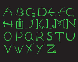 Green alphabet on a black background in modern styles