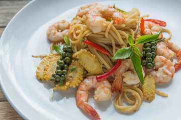 spicy stir fried spaghetti with shrimp and basil leaves ,Thailand style food
