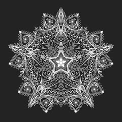 Beautiful complicated mandala. Ethnic graphic element. Big mandala seems like snowflake or white lace. It can be used for printing on t-shirts, postcards, or used as ideas for tattoos.
