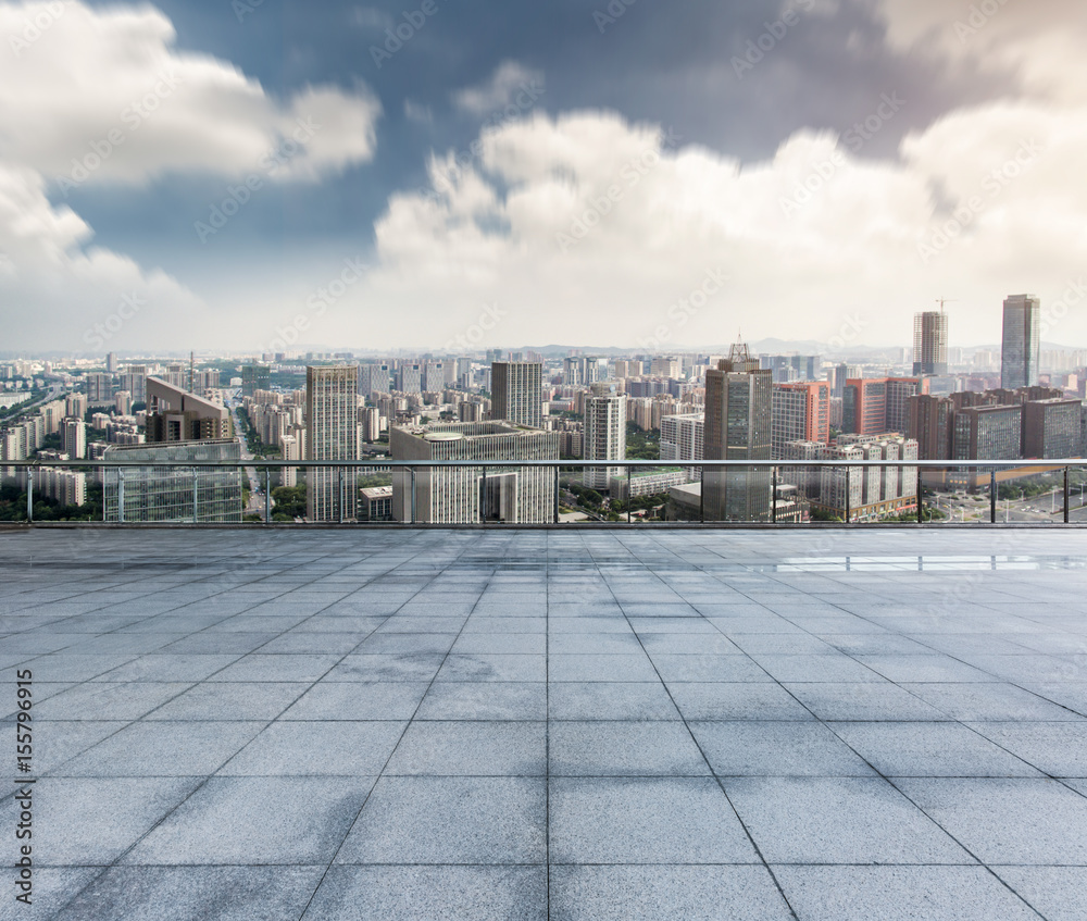 Wall mural Empty floor with modern city skyline