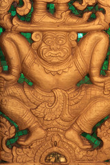 Window carving depicting Scene from The hindouisme. Ramakian, Ramayana. Wat Ong Teu Mahawihan. Temple of the Heavy Buddha. Vientiane. Laos.