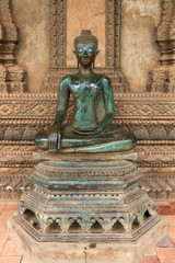 ancient sitting Buddha in Vientiane, Laos