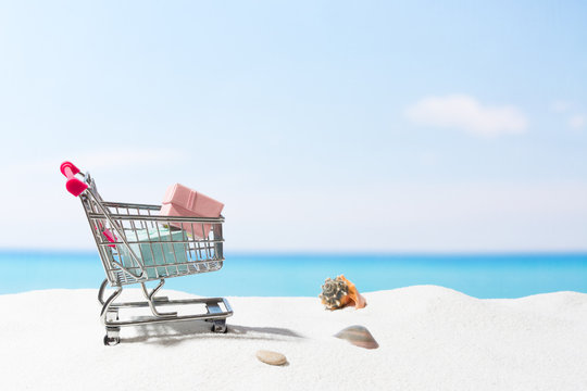 Summer Shopping.  Business And Selling On Beach. Cart On White Sand