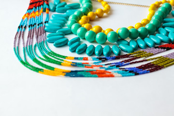 beaded necklace from colorful beads in the white background