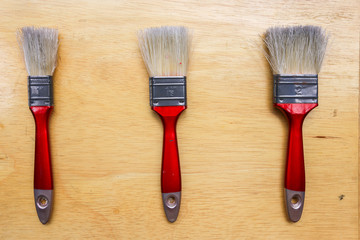 Paint Brush on a Wood Surface