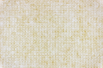Textile light background. Fibers on a yellow background.