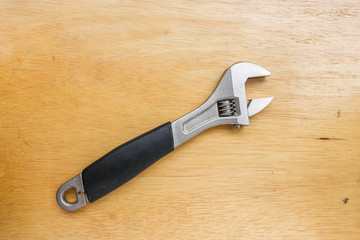 Wrench on a wooden table